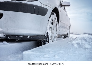 Best Winter Driving Tips With New Winter Tires. Close-up Of Car Tires In Winter