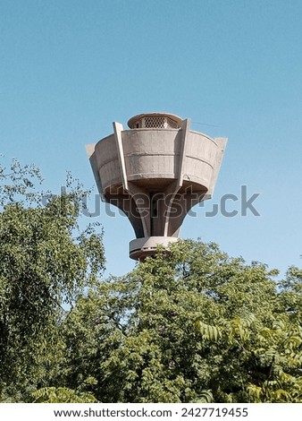 best-architectural-design-water-tank tower standing between trees