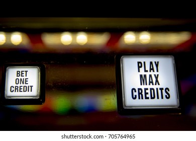 Bet One Credit And Play Max Credits  Buttons On Gambling Slot Machine.