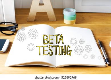 Beta Testing concept with notebook on wooden desk 