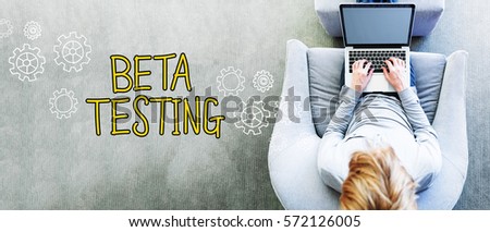 Beta Testing text with man using a laptop
