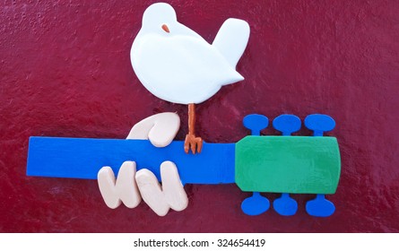 BETHEL, NEW YORK: The official logo of the Woodstock Music Festival features a white dove on a guitar neck.  This is from the original site marker sculpted by Wayne Saward in 1984.  September 27, 2015