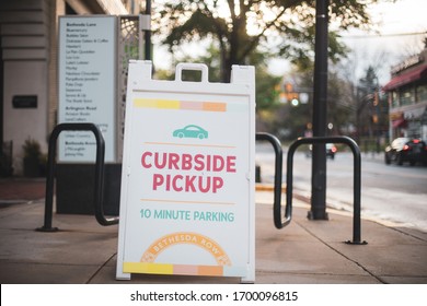 Bethesda, Maryland / USA - April 1, 2020: Restaurants in downtown Bethesda offer curbside pickup to ensure safety and social distancing during the COVID-19 pandemic.