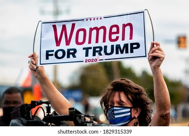 Bethesda, MD, USA - October 5, 2020: Women For Trump Sign Held By A  Woman Outside Walter Reed National Military Medical Center While Donald Trump Was Hospitalized With Covid-19