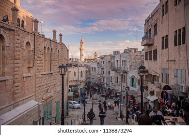 Bethlehem, Palestine - December 24 2017: The Street View Of Bethlehem With Decorations At Sunset On Christmas Eve.