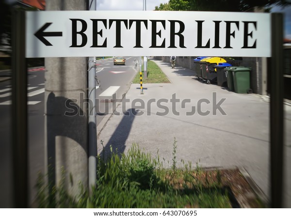 Better life. Arrow, motivation, poster,
quote, blurred image                              
