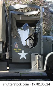  Betty Boop Cartoon Character Holding USA Flag Painted On A Vintage US Army Truck. Haworth, Yorkshire, UK, 22-05-2021