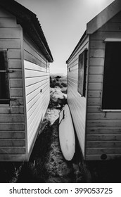 In between beach huts.