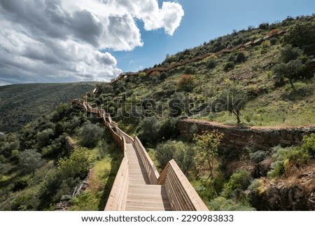 Between hills, the Passadiços do Côa, a wooden structure with a length of 930 meters and 890 steps in Foz Côa, Portugal
