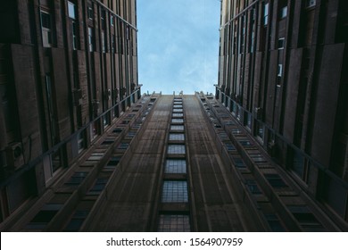 Between Old Brutalist Soviet Socialist Buildings. Brutalist Architecture Of Yugoslavia