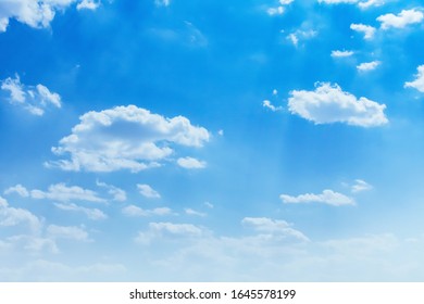 beuatiful blue sky with white cloud and sunshine background 