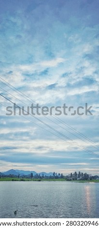 beuatiful field with cloudy sky