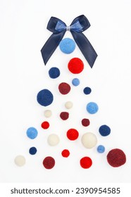 Beutiful christmas tree with blue ribbon and textile bow, the christmas ball. Christmas tree isolated on a whie background