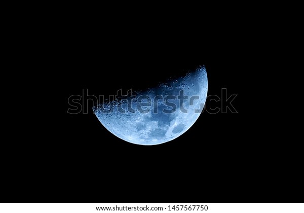Beutiful half moon in blue\
tone.