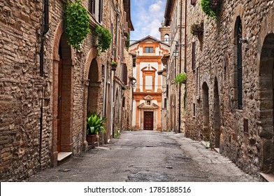 Bevagna, Perugia, Umbria, Italy: ancient church at the end of a narrow alley in the medieval town
