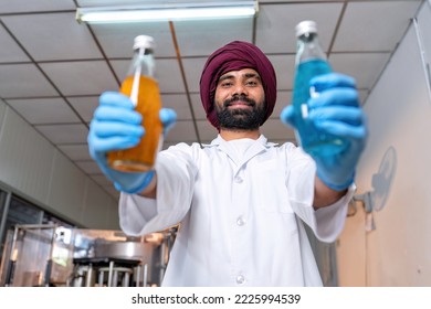 Beverage Laboratory Room Worker In Drink Factory Stand Hold Product Sample Portrait Smiling