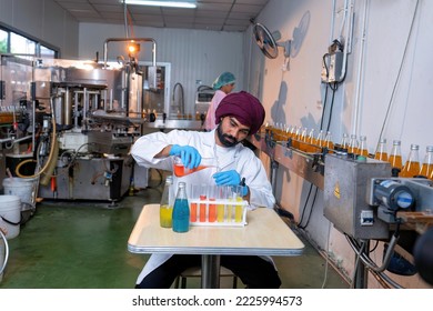 Beverage Laboratory Room Worker In Drink Factory Take Product Sample To Tube And Quality Assurance