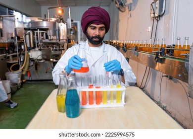 Beverage Laboratory Room Worker In Drink Factory Take Product Sample To Tube And Quality Assurance