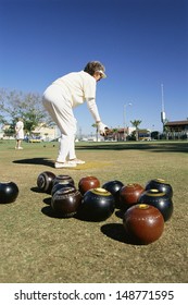BEVERLY HILLS, CA - CIRCA 1980's: Woman delivering ball in lawn bowling in Beverly Hills, CA