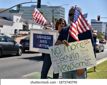 Beverly Hills, CA USA - Aug 1, 2020: Protesters Holding Signs To Recall California Governor Gavin Newsom