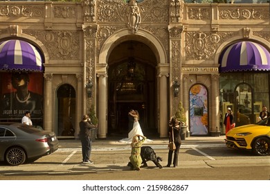 Beverly Hills, California - 
May 21, 2022:
Bride And Groom Pose For Wedding Photographers In Front Of The Beverly Wilshire Hotel
