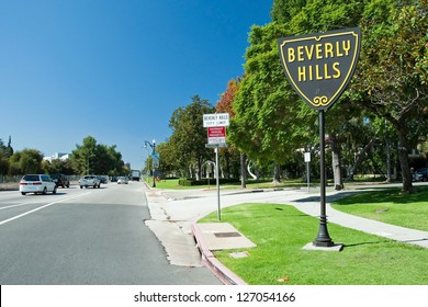 Beverly Hills sign in Los Angeles park with beautiful blue sky in background