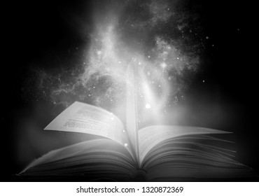 Bewitched Book With Magic Glows In The Darkness  - Shutterstock ID 1320872369