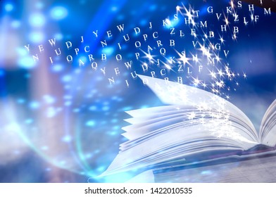 Bewitched Book With Magic Glows have The letters float out of the book in The Darkness - Shutterstock ID 1422010535