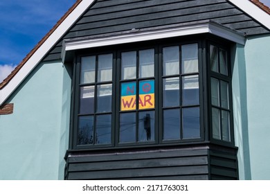Bexhill-on-Sea, East Sussex, United Kingdom - April 14th 2022: A no war protest sign in a window of a house protesting against the Russian Invastion of Ukraine