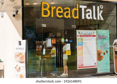 BGC, Philippines - Feb 12, 2021: Doing Contact Tracing Upon Entering BreadTalk Is The New Norm During Covid19 Pandemic 