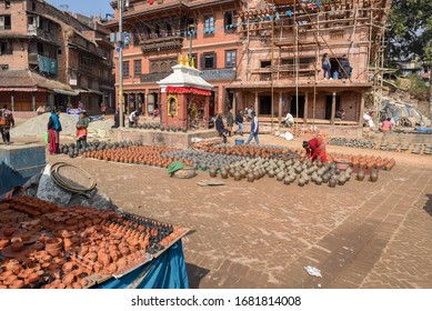 Bhaktapur, Nepal - 27 January 2020: woman working at Pottery square in Bhaktapur on Nepal
