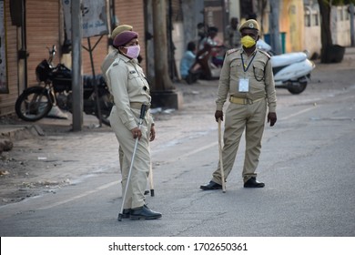 Bharuch, Gujarat / India - April 05 2020: Covid 19 Corona Virus 21 Days Lockdown In India. Police On Duty To Stop People From Roaming In City And Make Them Follow Lockdown To Prevent Spread Of Corona.