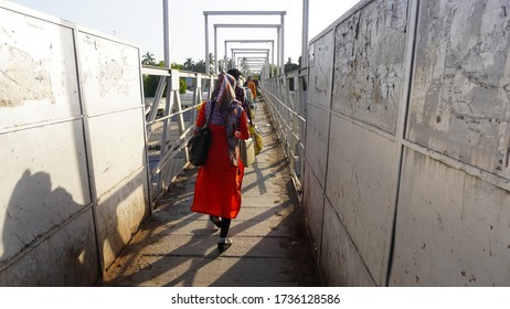 Bharuch, Gujarat / India: May 20, 2020: Indian Migrant Workers Affected Due To COVID 19 Corona Virus Nationwide Lockdown. Migrant Workers Returning Back Home Special Trains Bus Police Railway Station.