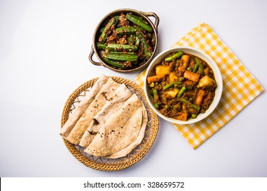 Bhindi Masala Or Ladies Finger Fry And Mixed Veg In Red Hot Curry Served With Indian Roti / Chapati Or Indian Flat Bread