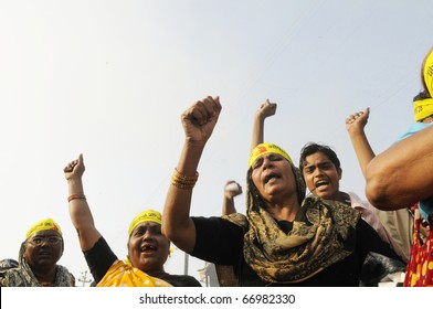 BHOPAL- DECEMBER 3: Angry women of Bhopal chant slogans during the rally to mark the 26th year of the Bhopal Gas Disaster  in Bhopal - India on December 3, 2010.