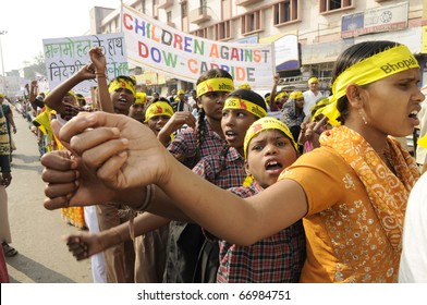 BHOPAL- DECEMBER 3: Protesters waive their hands during the rally to mark the 26th year of Bhopal Gas Disaster, in Bhopal - India on December 3, 2010.
