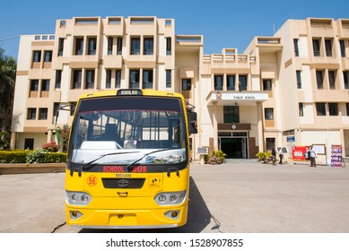 Bhopal / India 12 March 2019 Yellow Indian School Bus Parked In Front Of School Building At Bhopal Madhya Pradesh Central India