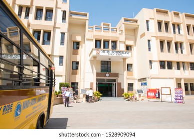 Bhopal / India 12 March 2019 Yellow Indian School Bus Parked In Front Of School Building At Bhopal Madhya Pradesh Central India