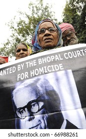 BHOPAL-DECEMBER 2: Older Generations Hold A Banner Asking For  Extradition Of Warren Anderson During The Rally To Mark The 26th Year Of The Bhopal Gas Disaster, In Bhopal -India On December 2,2010.