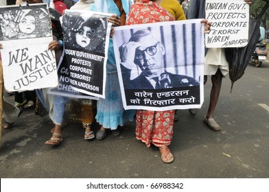 BHOPAL-DECEMBER 2: Victims Walk With An Image Of Warren Anderson And Asking For His Extradition During The Rally To Mark The 26th Year Of Bhopal Gas Disaster, In Bhopal - India On December 2,2010.