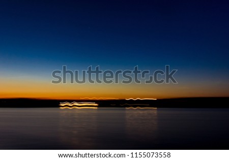 Similar – Sonnenuntergang am Sempachersee