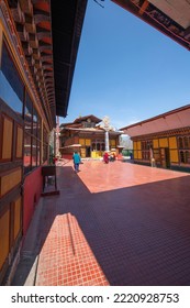 Bhutan - February 12 2020: Bhutan Temple And Some Monks.