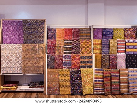 Bhutanese textile on the shelves 