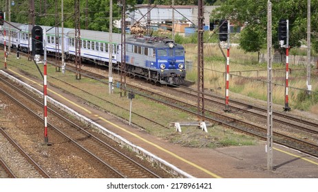 BIALOGARD, WEST POMERANIAN - POLAND - 2022: Passenger Express Train Enters To Station