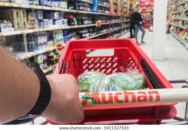 Bialystok/Poland May 29, 2019 \
View of Auchan\
supermarket logo. Auchan is a French international supermarket\
chain, is one of the largest distribution\
groups.