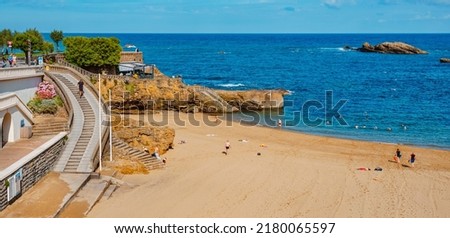 Biarritz, France - June 24, 2022: A view of the Plage du Port Vieux beach in Biarritz, France, early in the morning in a summer day