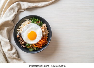 Bibimbap, Korean spicy salad with rice and fried egg - traditionally Korean food style