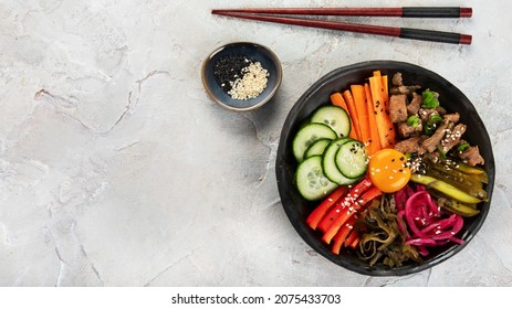 Bibimbap With Snacks On Gray Background. Traditional Korean Food. Top View, Flat Lay, Copy Space