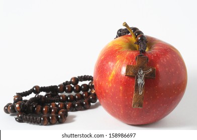 Bible Eva's Sin Red Apple Over A White Background