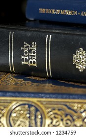 Bible And Koran (Qur'an) And Book Of Mormon (focus On Bible)